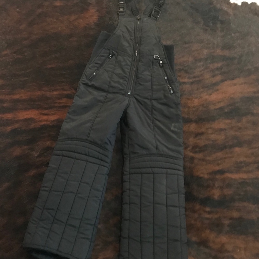 Black ski bibs.